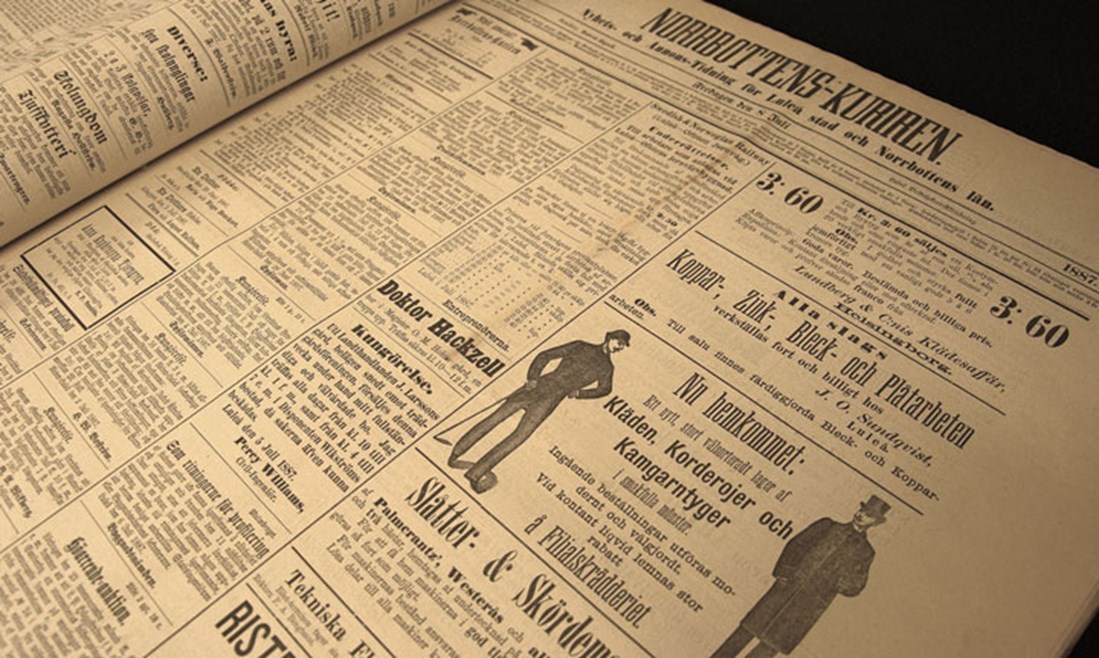 Ett äldre tidningsuppslag från Norrbottens-Kuriren med text och annonser Norrbottens Kuriren